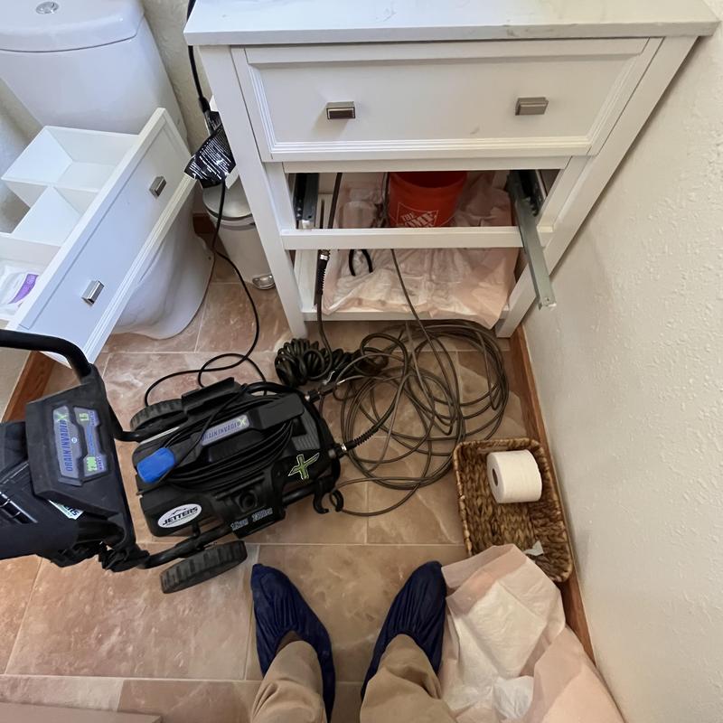 Hydro jetting under a sink